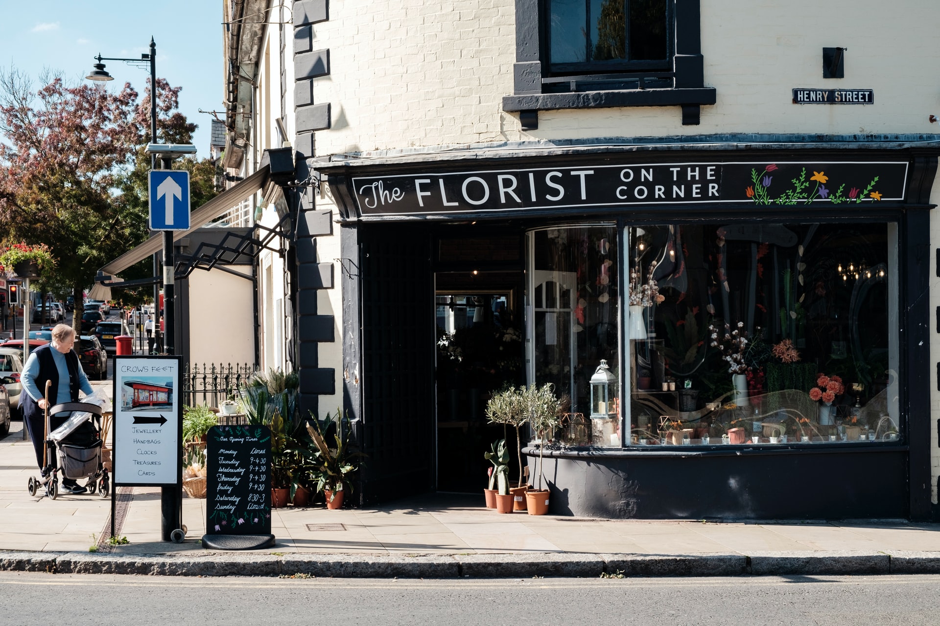 Local country. Flowers on the Streets. Small Town shop. Street Store. Hamifleurs.